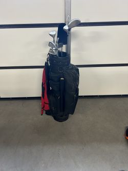 Used Gold Bag With Clubs 