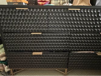 Black and gold dresser