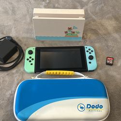 Nintendo Switch- Animal Crossing Edition (Matching Case, HDMI Cord, and Mario Kart Included)