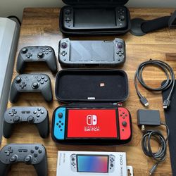 Nintendo Switch OLED with Pro Controllers And Other Accessories 