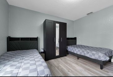 Twin beds with mattresses