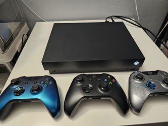 Xbox One X with 3 controllers