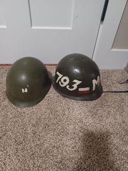 military helmet collecting 4 helmets... WWII, VIETNAM, KOREA, GOLF WARS.