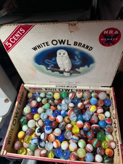 Cigar box full assorted marbles
