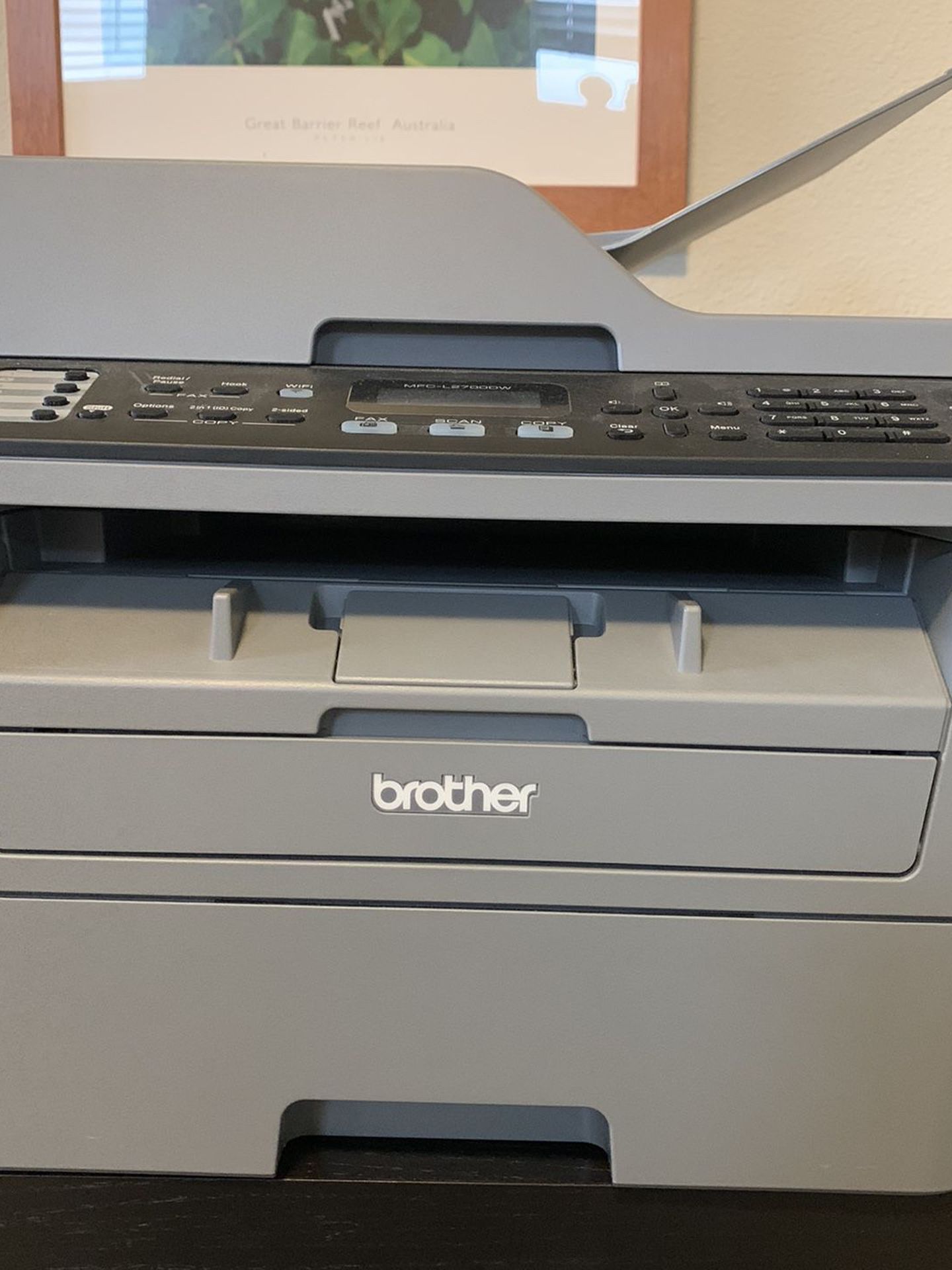 Used Wireless brother MFC-L2700W copier, fax , and printer