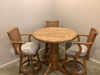Pub style table with 3 barstools
