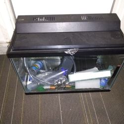 Fish tank and thermostat and tank cleaner .