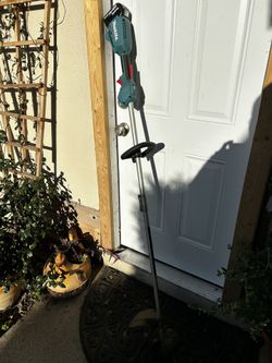 Makita Trimmer With 4 Ah Battery