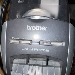 The image shows a Brother QL-570 Professional Label Printer