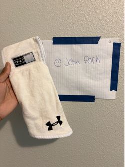 White under Armour football towel
