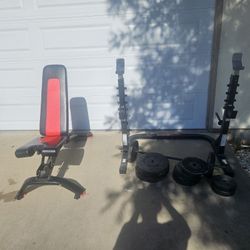 Workout Aquiement Plus The 80 Pouds Bar And 90 Plouds Plate.