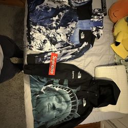 SUPREME PARKAS, STATUE OF LIBERTY AND MOUNTAIN 