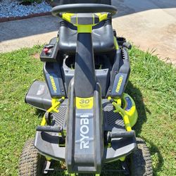 Ryobi 30 Inch Riding Lawn Mower.