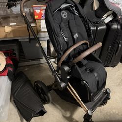 Cybex Premium Stroller And Carrycot Black And Rose gold And Kickboard  