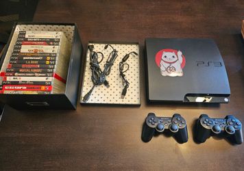 Sony PS3 Slim Bundle with 2 Controllers and Games