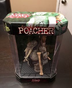 McFarlane Toys special edition Total Chaos "Poacher" in collector "fish tank" display.