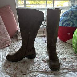 Brown Boots With A Small Platform On The Heel 