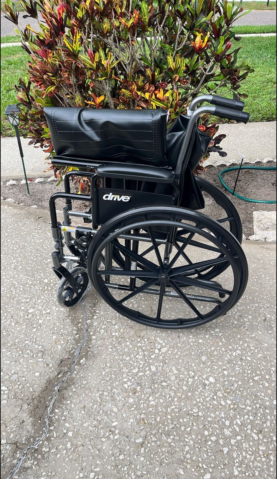 New Wheel Chair Ready For Service With Leg Rests.