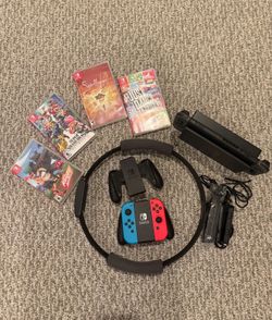 Nintendo Switch Console & Game Bundle (Ring Fit, Smash Bros & More)