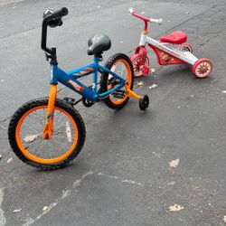 Hot Wheels bike and Elmo Tricycle