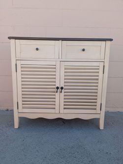 Cream Wood Cabinet with Shutter Doors