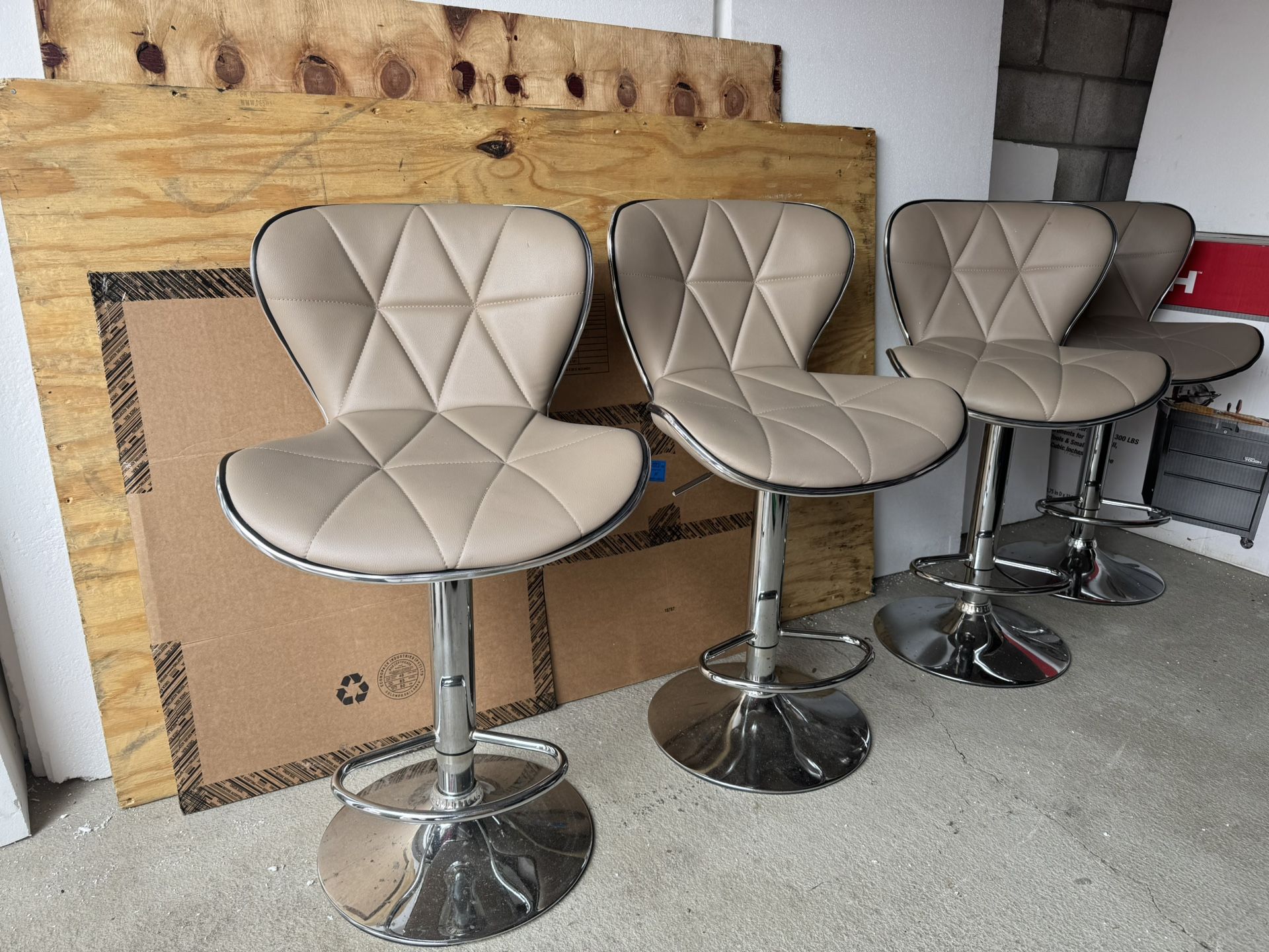 Four Adjustable Swivel Barstools
