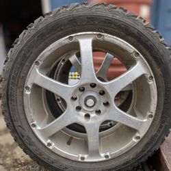 Studded Snow Tires on Aluminum Rims