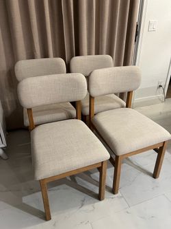 4 Brand new real solid wood and linen dining chairs