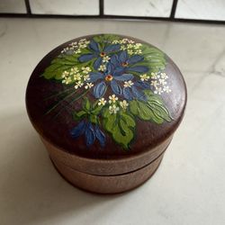 Precious Vtg Handmade Handpainted Floral Wood Trinket Box Approx 2.25” x 2”  This vintage wooden trinket box features a hand-painted blue floral desig