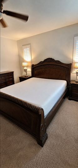 Bedroom set with king bed frame and dressers