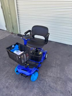 SKRT Mobility Scooter for Adults and Seniors, skmc Rechargeable 4-Wheel Electric Travel Device, Lightweight and Portable, with LED Headlights and Bask
