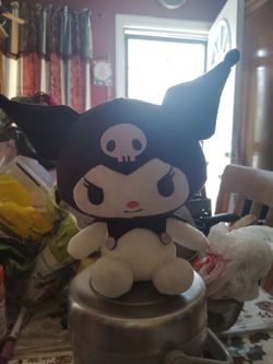 Hello Kitty stuff toy and I will give you some Hello Kitty stuff for free