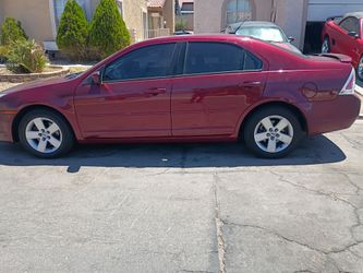2007 Ford fusion SE cold AC pass smog certificate just under 100,000 milesfirm on price