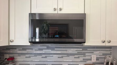 Black stainless steel Samsung Above range microwave
