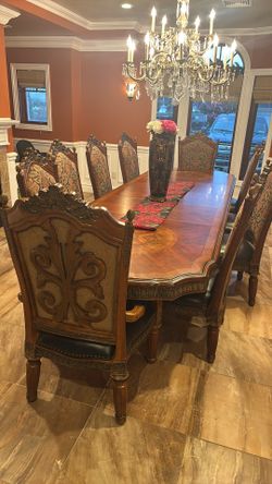 Dining room set including 10 chairs and a vanity