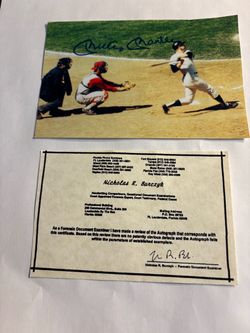 Examined and verified by Nicholas R Burczyk Mickey Mantle photo of Mickey Mantle at bat. Signature is verified!