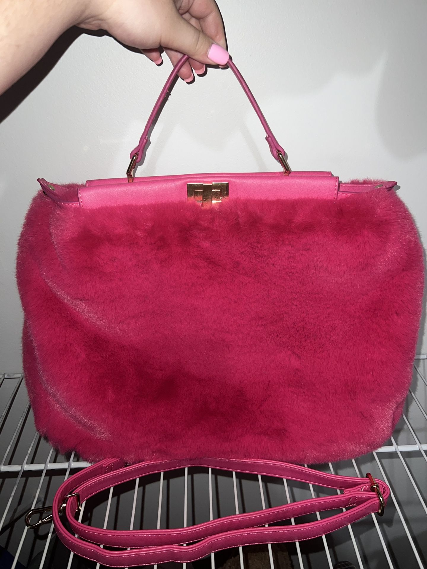 Pink fuzzy purse