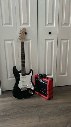 Electric guitar, amplifier & cable