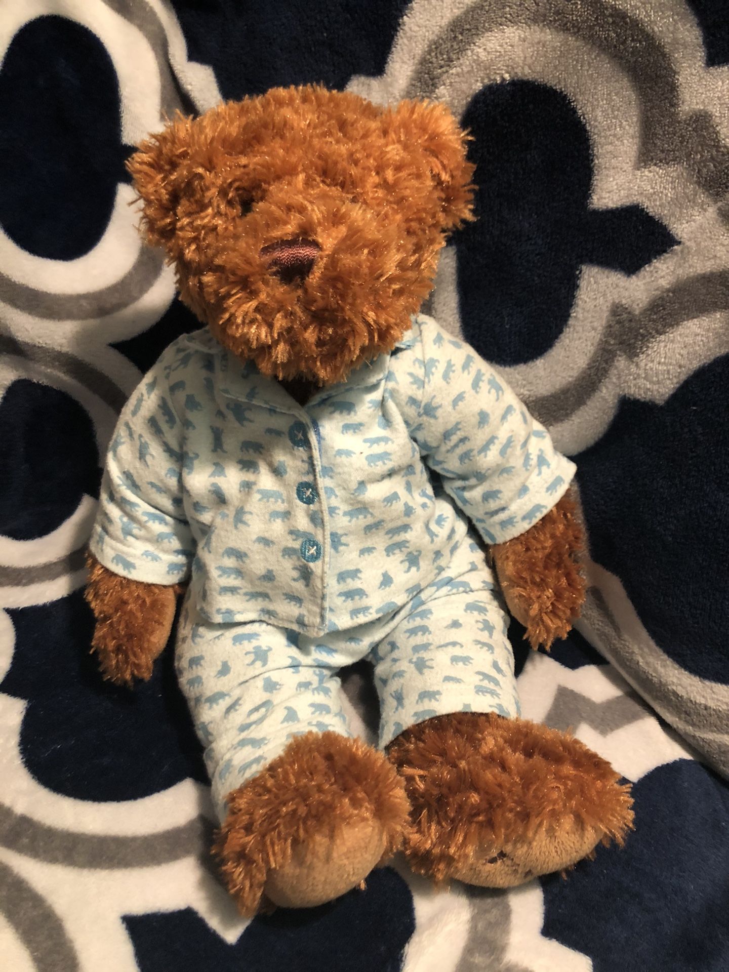 Cute chocolate teddy bear with pijamas