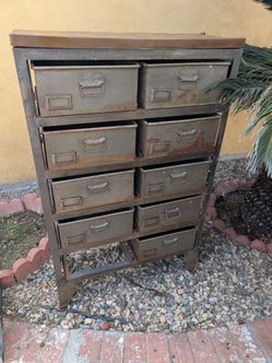 5 ft metal organizer in very good condition. Only one in the bottom missing. I have nine the drawer. You can zoom in the picture you will see it. They