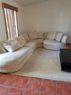 Off white downfeather couch.