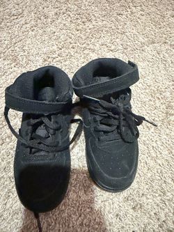 Kids black Nikes