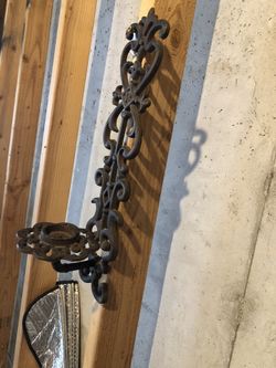 Cast iron candle holder