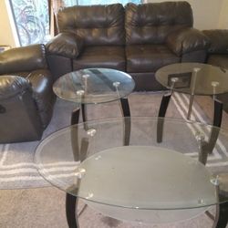 1 Set of living room furniture, 1 set of 3 glass table, and carpet. USED-GOOD.
