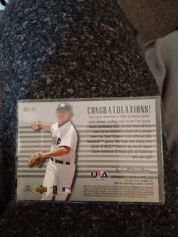 Baseball card with some type cloth inside or some shit