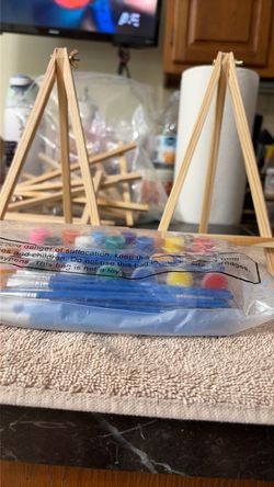 Easels with art supplies