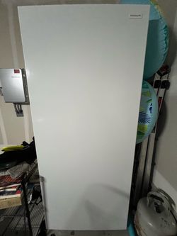 Frigidaire  upright freezer or fridge