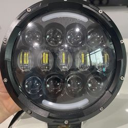 A Set of  7" Jeep Wrangler LED Headlight/off-Road  Mount.