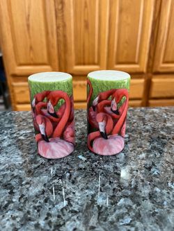 Vintage Flamingo Souvenir Ceramic Pair of Salt and Pepper Shakers “Woodland Park Zoo, Seattle”. Size approximately 3 inches tall. Brand new never us