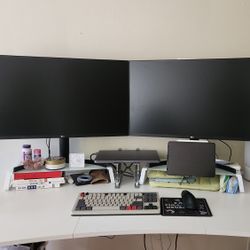 Dual monitor arm for 2 monitors holding up to 32 inches